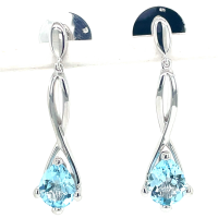 zilveren oorknoppen hangend met blauwe topaas - 57725